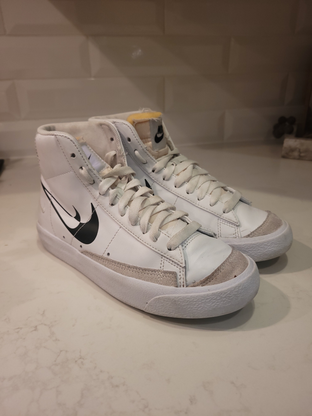 Nike Kids White High-Top Sneakers with Black Swoosh and Light Gray Suede
